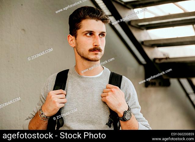 Young handsome bearded hipster man. High quality photo