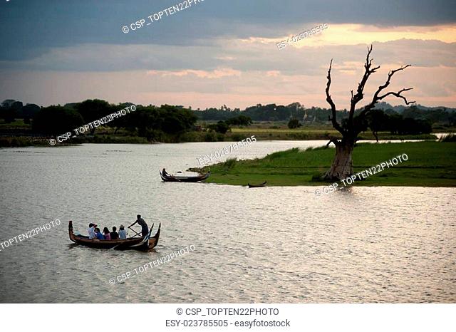 Traditional boat on the lake near Uben bridge in Myanmar