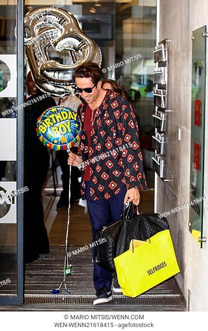 Nick Grimshaw leaving the BBC Radio 1 studios holding balloons on his 30th birthday Featuring: Nick Grimshaw Where: London