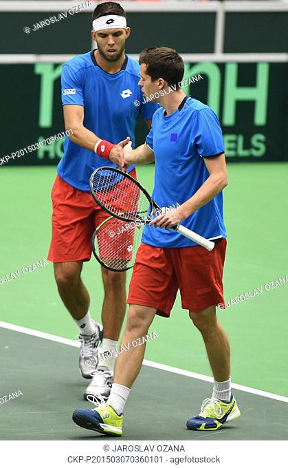 Adam Pavlasek (right) and his partner Jiri Vesely (left) of Czech Republic pictured during their Davis Cup World Group first round doubles tennis match against...