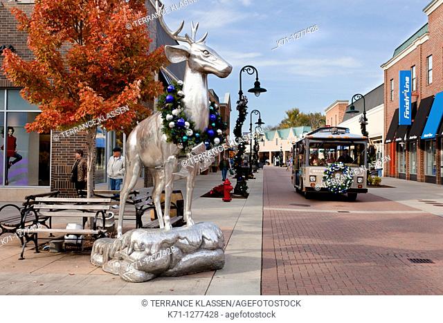 Silver deer statues decorated for Christmas at the Branson Landing shopping center in Branson, Missouri, USA