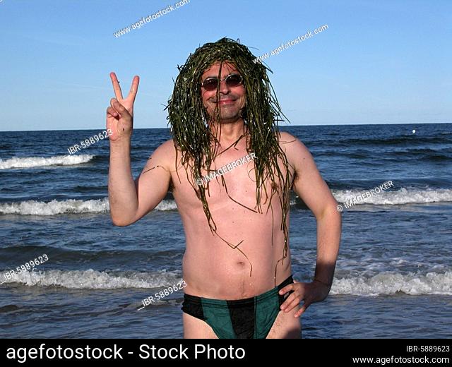 Hippie, parody, hair from seaweed, Rügen, Baltic Sea