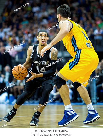 Ismet Akpinar (R) of Alba Berlin and Danny Green (L) of the San Antonio Spurs in action during the NBA Global Games match between Alba Berlin and San Antonio...