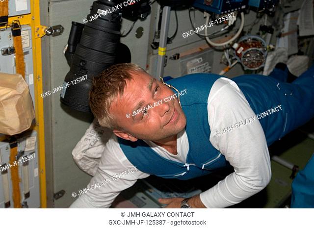 Russian cosmonaut Maxim Suraev, Expedition 21 flight engineer, is pictured in the Zvezda Service Module of the International Space Station