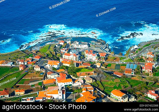 Aerial view of Porto Moniz town, famous for its natural volcanic lava pools. Madeira