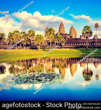 Angkor Wat temple reflecting in water of Lotus pond at sunset. Siem Reap. Cambodia