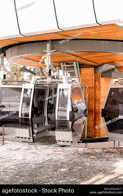 Empty cable car with a caucasian mountain