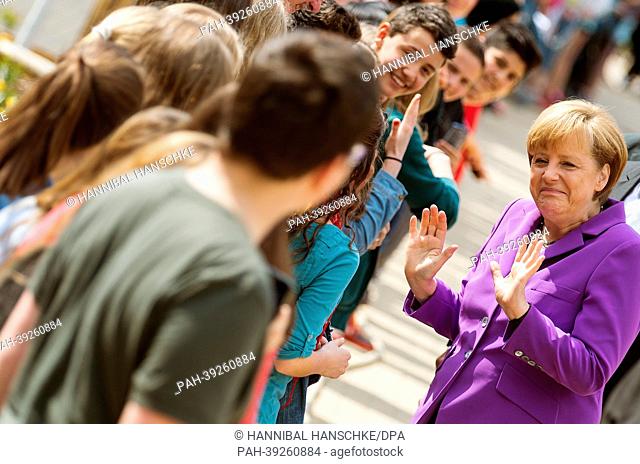 German chancellor Angela Merkel vists the Johann-Gottfried-Herder high school in Berlin, Germany, 06 May 2013. She visited the school to discuss about Europe on...