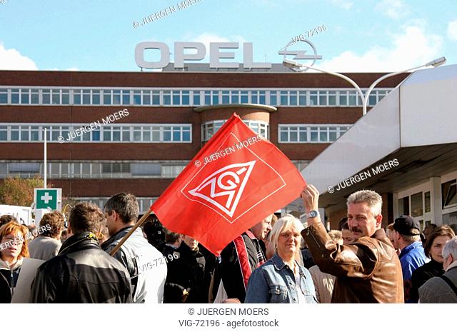 Employers of the car works of the Adam Opel AG in Bochum demonstrating against announced dismissals. Employer with a flag of the industrial trade union metal (...