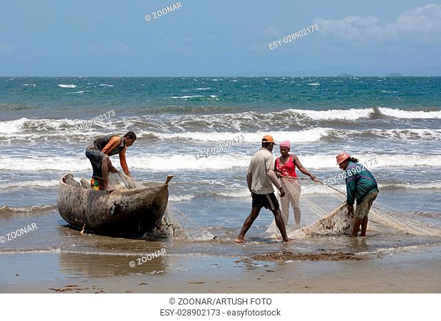 Native Malagasy fishermen fishing on sea, Madagascar