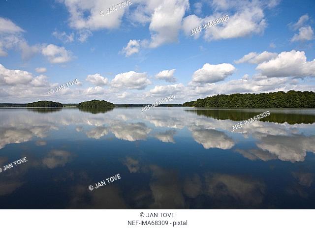 Clouds reflected on the surface of a lake Sweden