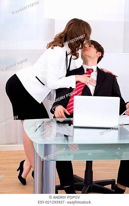 Sensuous Secretary Seducing Businessman At Desk