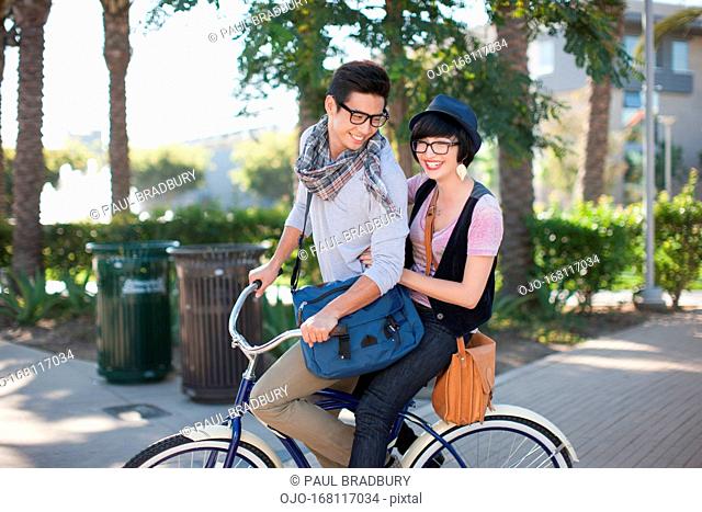 Two students on bicycle