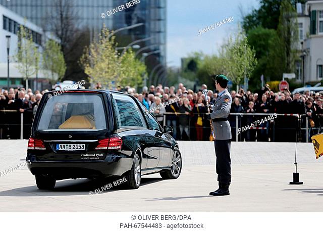 The coffin of late German foreign minister Hans-Dietrich Genscher is moved to a cemetery from the former German Bundestag parliament following an Act of State...