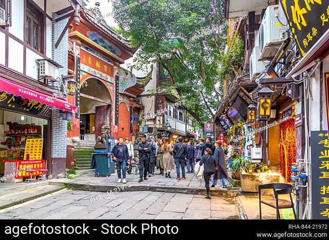 Busy shopping street in Ciqikou Old Town, Shapingba, Chongqing, China, Asia