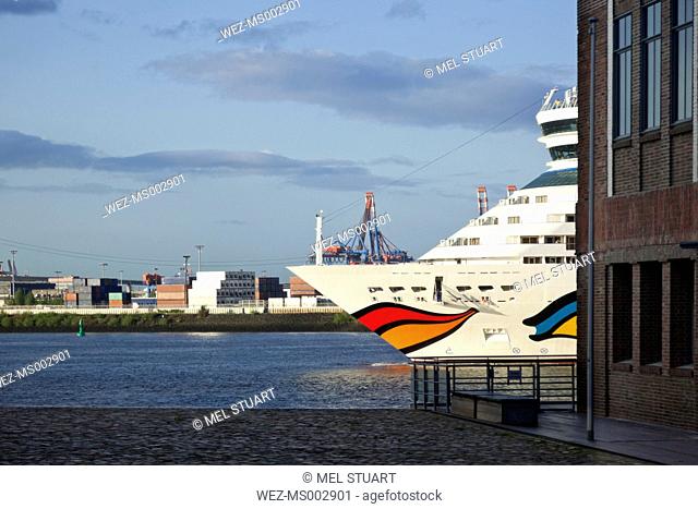 Germany, Hamburg, View of Cruise ship with river Elbe at harbour