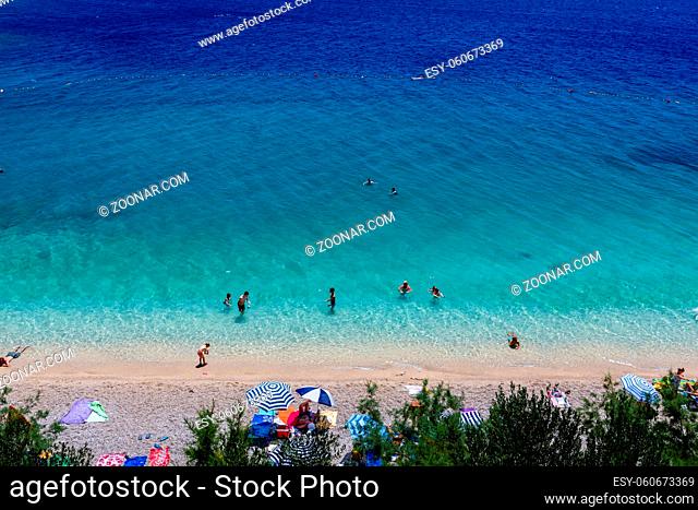 Beautiful Adriatic Beach and Transparent Blue Water near Split, Croatia