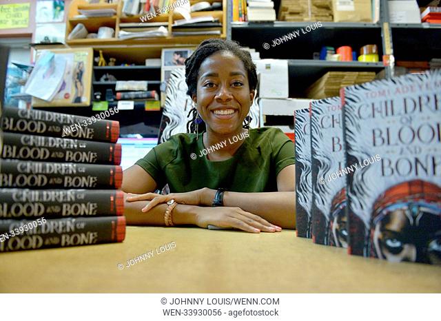 Author Elizabeth Acevedo of 'The Poet X' and author Tomi Adeyemi of 'Children of Blood & Bone' read and sign copies of their books at Books and Books on March...
