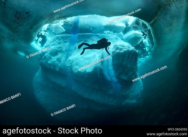Only in springtime, when the hard winter slowly subsides, are the ice-cold waters suitable for divers who can dive around a iceberg that floats in crystal-clear...
