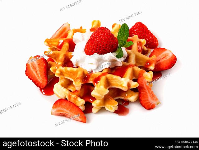 viennese waffles with strawberry and sweet syrup isolated on white background