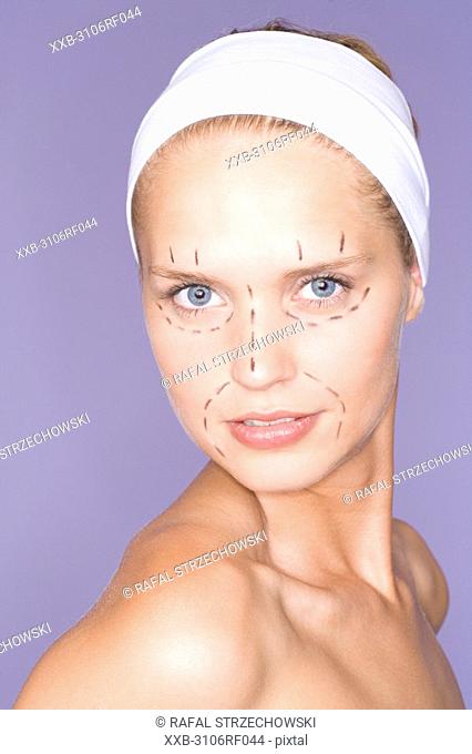 woman marked for plastic surgery