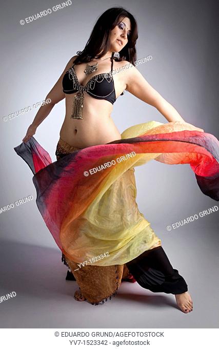 Beautifull belly dancer with veil