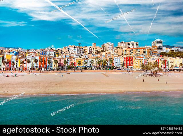 Aerial drone point panoramic view coastline and La Vila Joiosa Villajoyosa touristic resort townscape view from top, sandy beach and mediterranean seascape