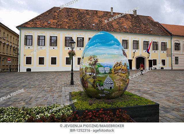 Giant Easter egg from the heart from Croatian naive artists in front of Banski Dvori, Ban's Palace, St Mark's Square, Markova trg, Gornji Grad, Zagreb, Croatia
