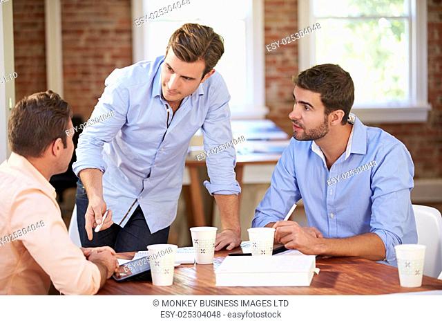 Group Of Businessmen Meeting To Discuss Ideas