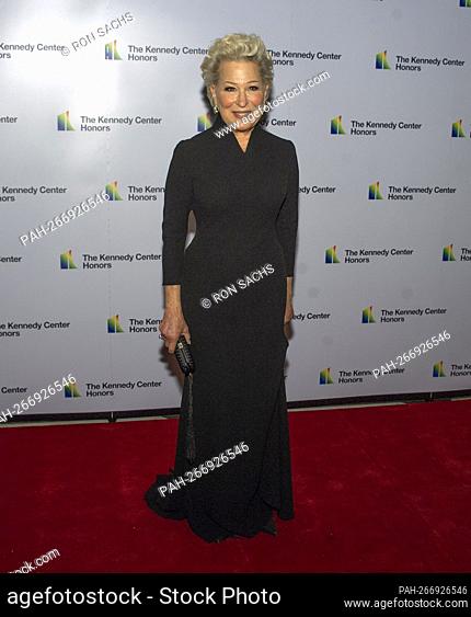 Legendary stage and screen icon Bette Midler arrives for the formal Artist's Dinner honoring the recipients of the 44th Annual Kennedy Center Honors at the...