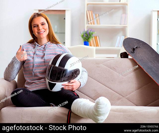 The young woman with broken leg at home