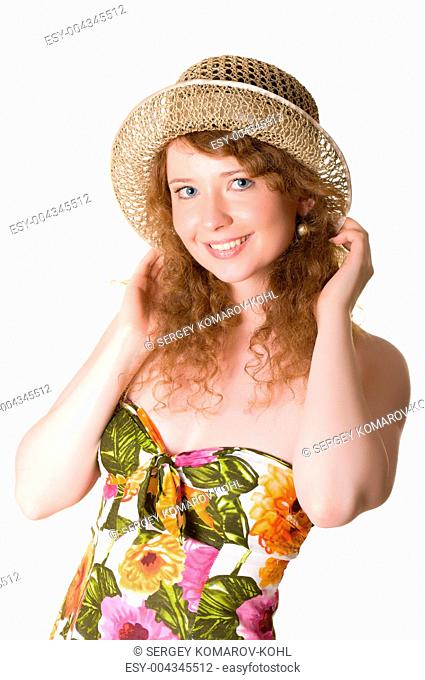Joyful woman in a straw hat
