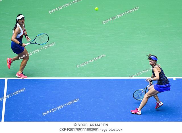 From left Chan Yung-Jan of Taiwan and Martina Hingis of Switzerland in action during the doubles final of US Open Tennis Tournament in New York, USA