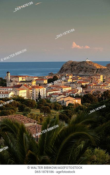 France, Corsica, Haute-Corse Department, La Balagne Region, Ile Rousse, elevated city view with Ile de la Pietra, dawn