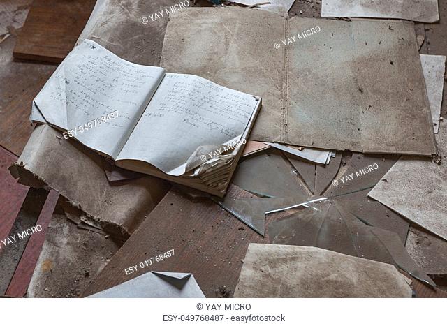 Abandoned notebooks and books in kindergarten. Chernobyl, Ukraine
