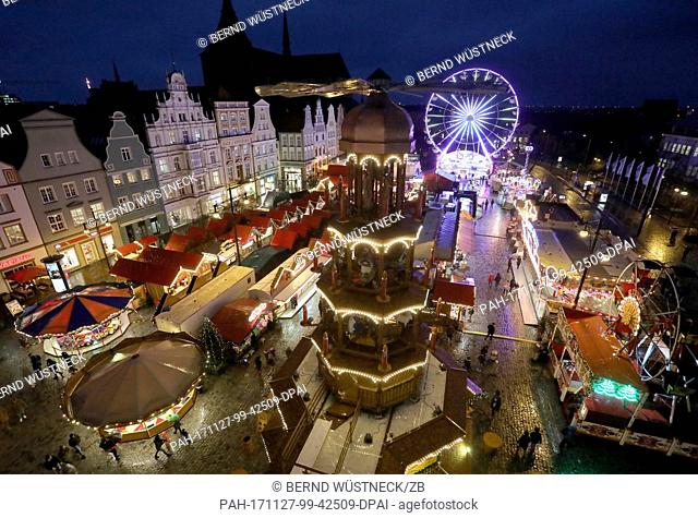 View of the Christmas market with visitors after its opening in Rostock, Germany, 27 November 2017. About 1.5 million visitors are expected for the largest...