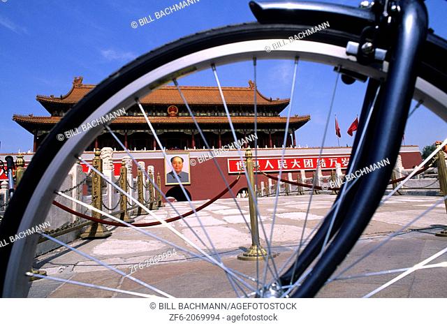 Graphic image of bike and Mao portrait at Heavenly Gate in Beijing China
