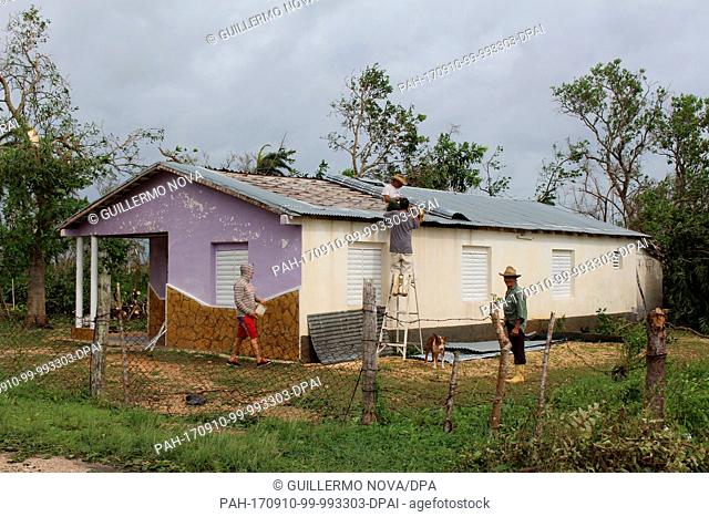 Residents struggle to repair their houses in Villa Clara, Cuba, 10 September 2017. The hurricane ""Irma""Â has caused significant damage in Cuba