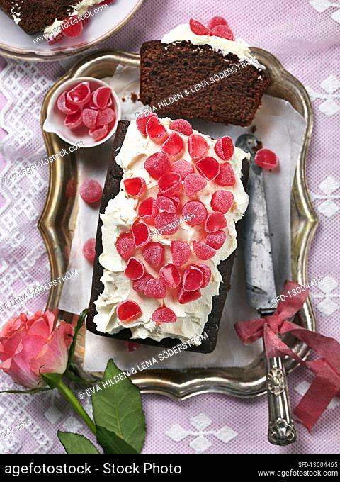 Chocolate sponge cake with candy for Valentines day