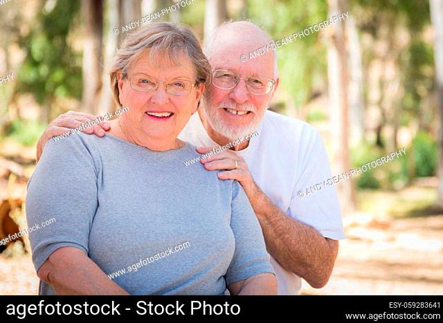 Happy Senior Couple Portrait Outdoors At Park