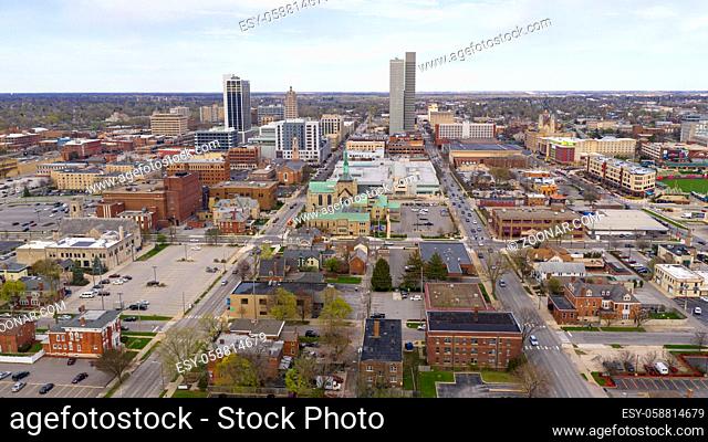 Colorful buildings businesses and churches line up by streets in this aerial view of Fort Wayne Indiana