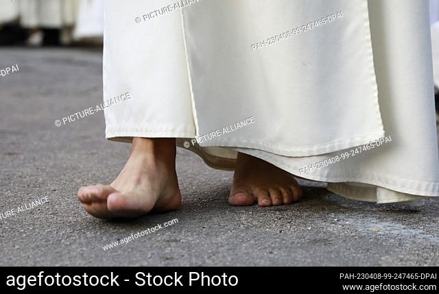 07 April 2023, Spain, Palma: Penitents participate barefoot in the procession ""Sant Enterrament"" (Holy Burial) in Palma