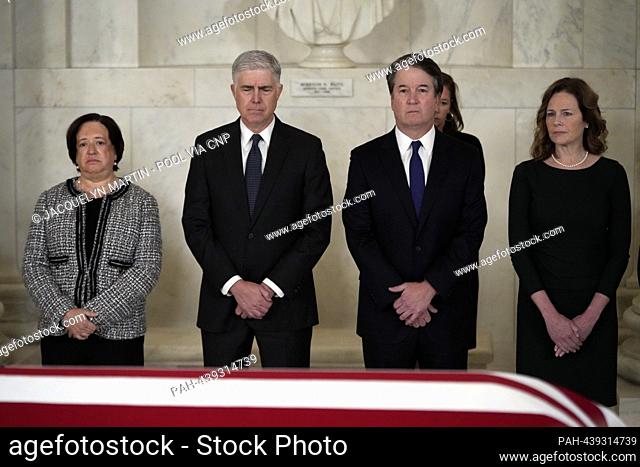 From left to right: Associate Justices of the Supreme Court Elena Kagan, Neil M. Gorsuch, Brett Kavanaugh, and Amy Coney Barrett listen during a private...