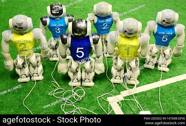 20 February 2020, Saxony, Leipzig: In the robot laboratory of the Nao-Team of the University of Applied Sciences (HTWK) the batteries of the robot soccer...