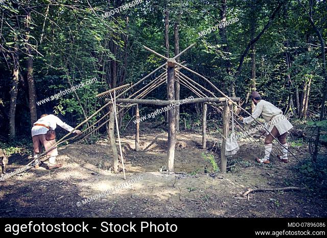 Lombards 6th/7th Century, Italy, Friuli Venezia Giulia:daily duties. The grubenhaus is a pit-house very common for Germans and Italian Lombards