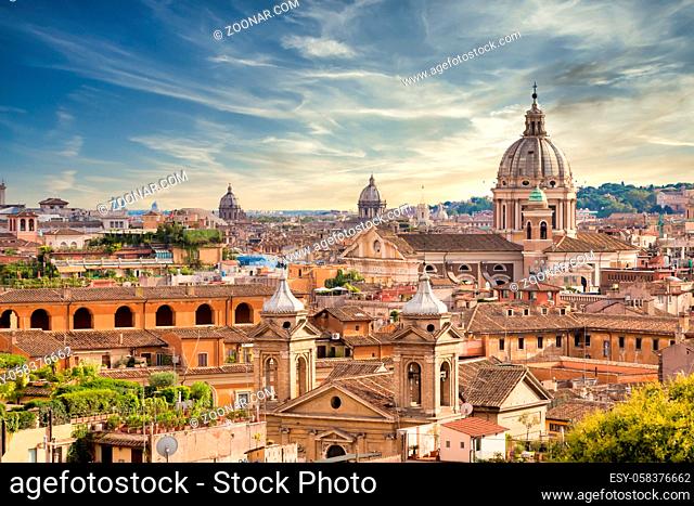 ROME, ITALY- CIRCA AUGUST 2020: panoramic cityscape with sunset sky and clouds