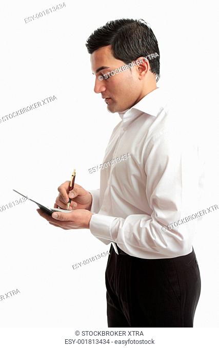A businessman or waiter wriring in a notebook or taking an order. White background