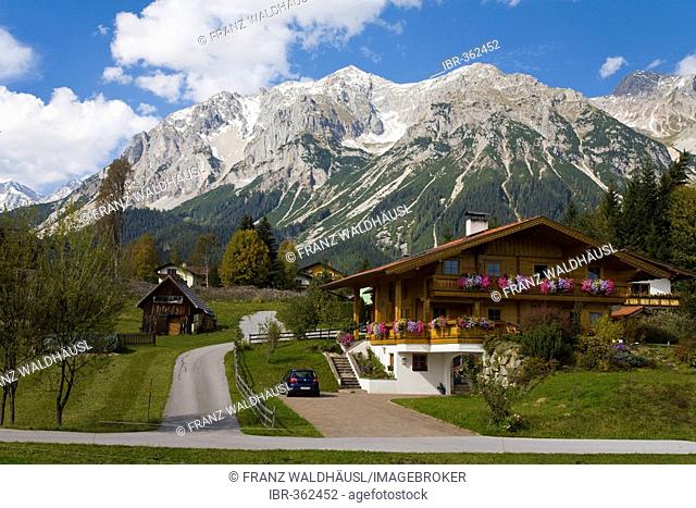 One-family house in front of Dachstien Mountain Range, Austria, Styria, Ramsau