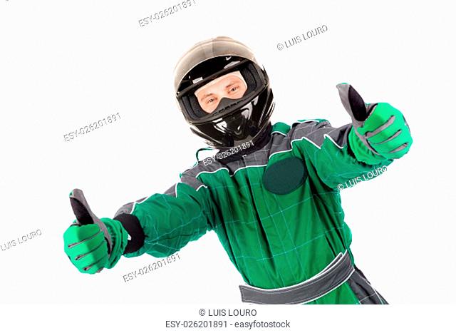 Racing driver posing with helmet isolated in white