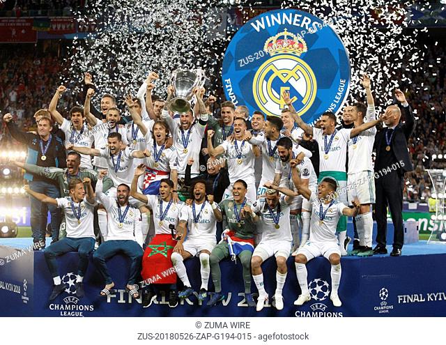May 26, 2018 - Kiev, Ukraine - Real Madrid players celebrate with the trophy after winning the UEFA Champions League final soccer match Real Madrid vs Liverpool...